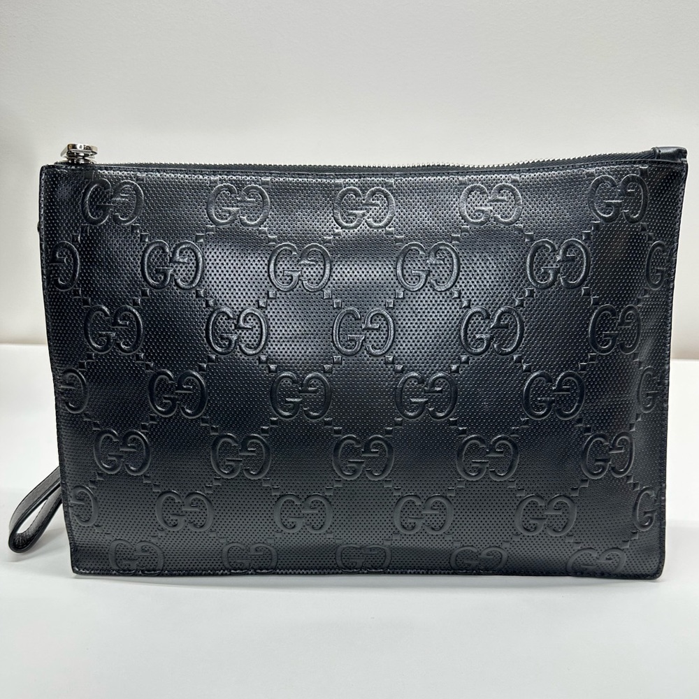 GUCCI
Leather clutch bag